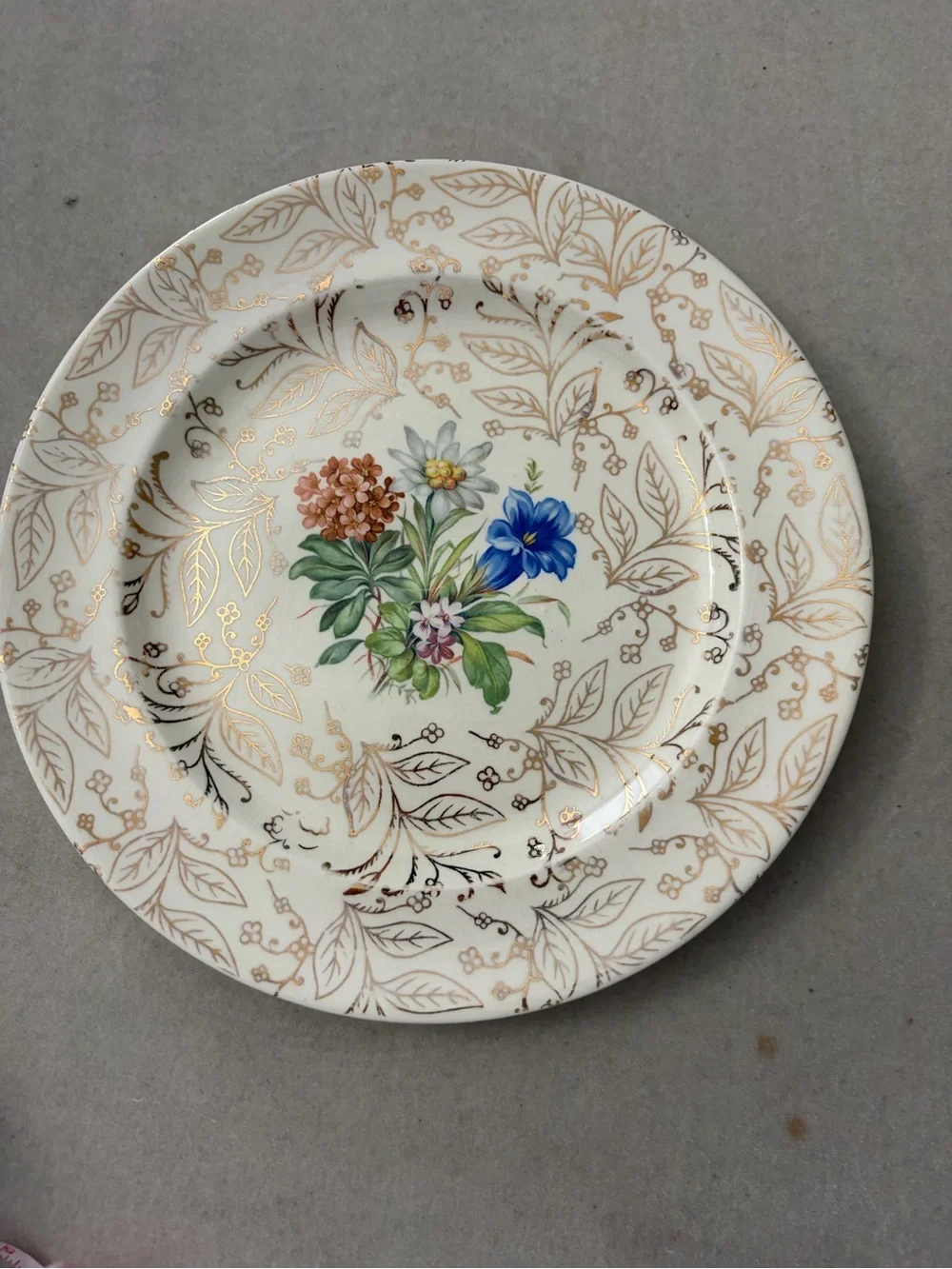 White Porcelain Dinner Plate with Gold Leaf and Floral Center